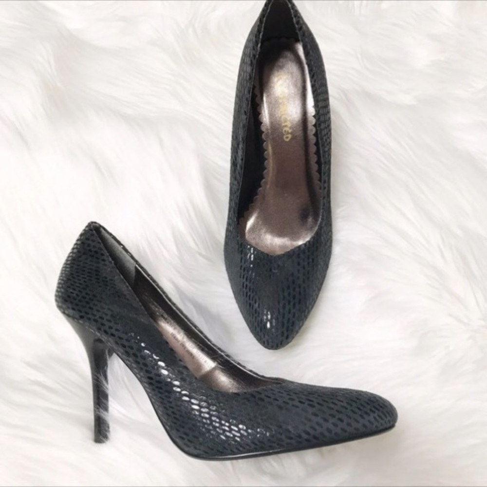 Restricted Leather Pumps